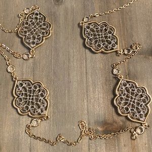 Long silver and gold filigree necklace